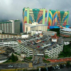 Aerial view of the colorful First World Hotel, a landmark in Malaysia's Genting Highlands.